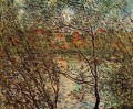Primavera a través de las ramas Claude Monet